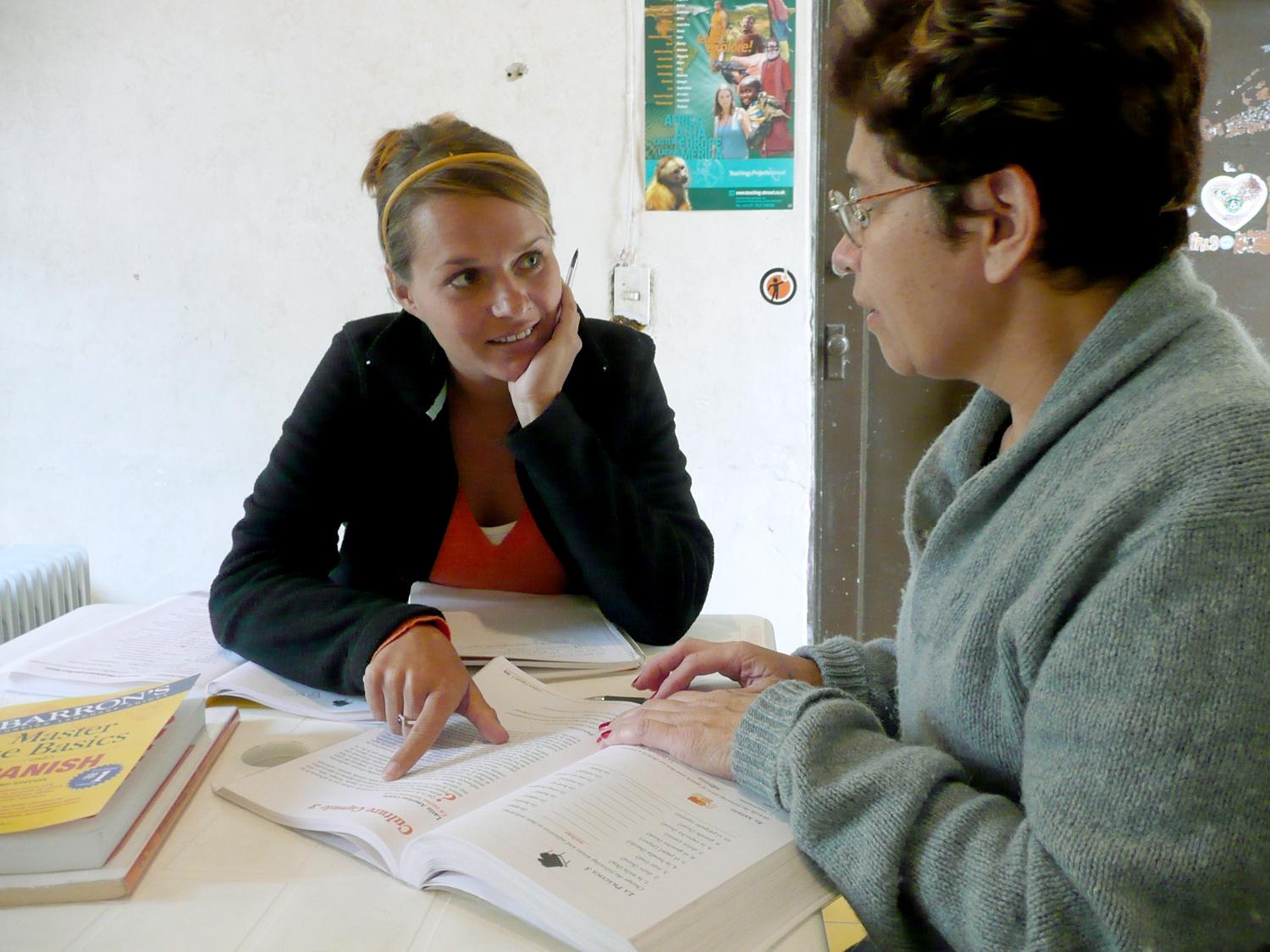 Volunteer Language Courses A volunteer listens intently to her tutor during her Arabic language course in Morocco.