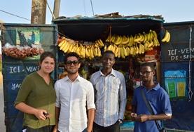 Volunteer Language Courses Volunteers practise their newly learned Wolof language skills with local vendors in Senegal.