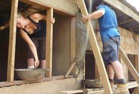 Volunteer Ghana Volunteers work on building the framework for a house being constructed in a local community in Ghana.