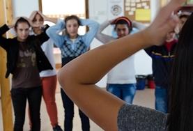 Volunteer Creative & Performing Arts A Dance volunteer holds a dance class rehearsal with local students in Romania.