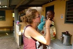 Volunteer Medical Electives A dentistry student doing her elective in Togo examines a local child's teeth.