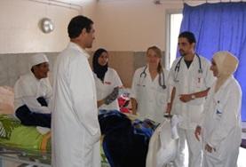 Volunteer Morocco A physiotherapy intern listens as local medical staff explain a patient's condition at her elective placement in Morocco.