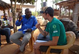 Volunteer Togo An International Development volunteer discusses sustainable business plans with the staff member of a local NGO in Togo.