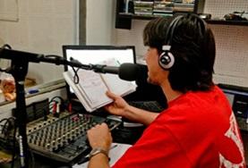 Volunteer Journalism A Journalism intern observes as a radio DJ demostrates the basics of radio journalism in Argentina.