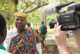 Volunteer Journalism A Journalism intern conducts an interview with a man for a local news broadcasting company in Togo.