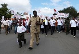 Volunteer Law & Human Rights Human Rights interns and local legal staff in Tanzania come together for a march to protest human rights violations against women and children.