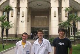 Volunteer Medicine & Healthcare Dentistry interns stand outside their internship placement hospital in China.