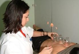 Volunteer Medicine & Healthcare A Medicine intern observes as a local doctor performs a traditional Chinese medicine technique known as cupping.