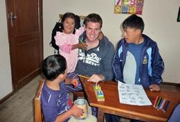 Volunteer Teaching A professional special educational needs teacher gives a lesson to a group of disabled children in Bolivia.