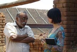 Volunteer Journalism A professional journalist gains experience overseas interviewing a man at one of our volunteer internships.