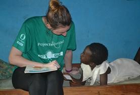 Volunteer Social Work A Social Work intern works with a local child in Ghana under the guidance of a qualified mental health professional.