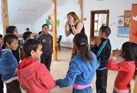 Volunteer Social Work A Social Work volunteer works with a group of children at our placement in Romania.